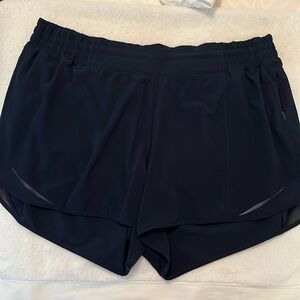 Lululemon hotty hot high rise short 4”. Navy blue. Size 14 tall